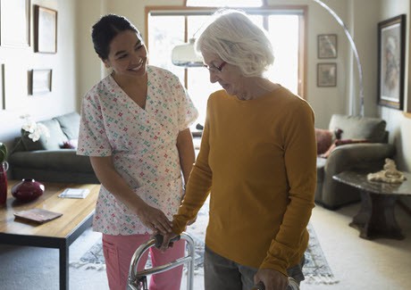 provider of home care in Scarborough walking with senior